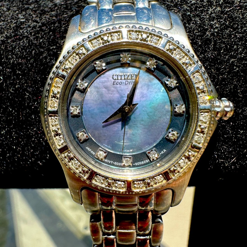Citizens Eco-drive women’s diamond bezel face watch with invisible closure